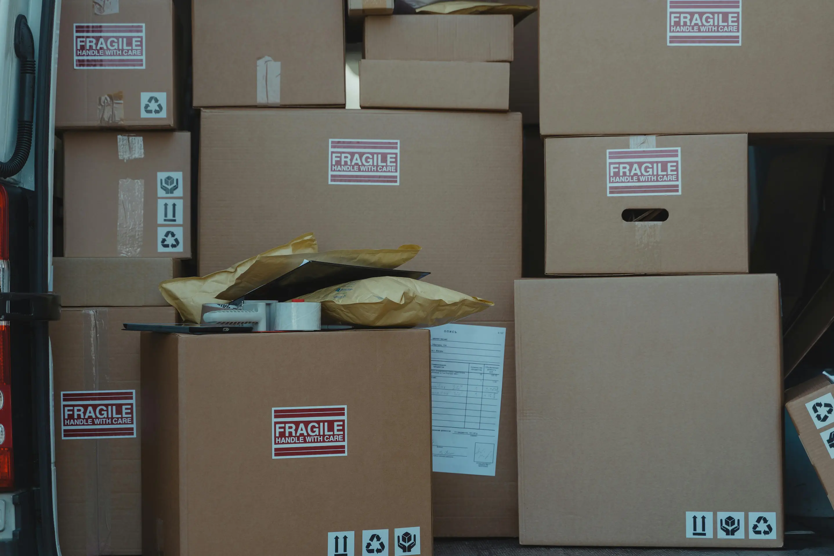 Returns sorting station with items being inspected and re-packaged